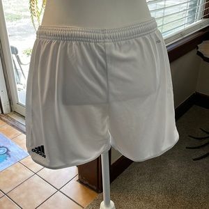 Adidas white sports shorts.